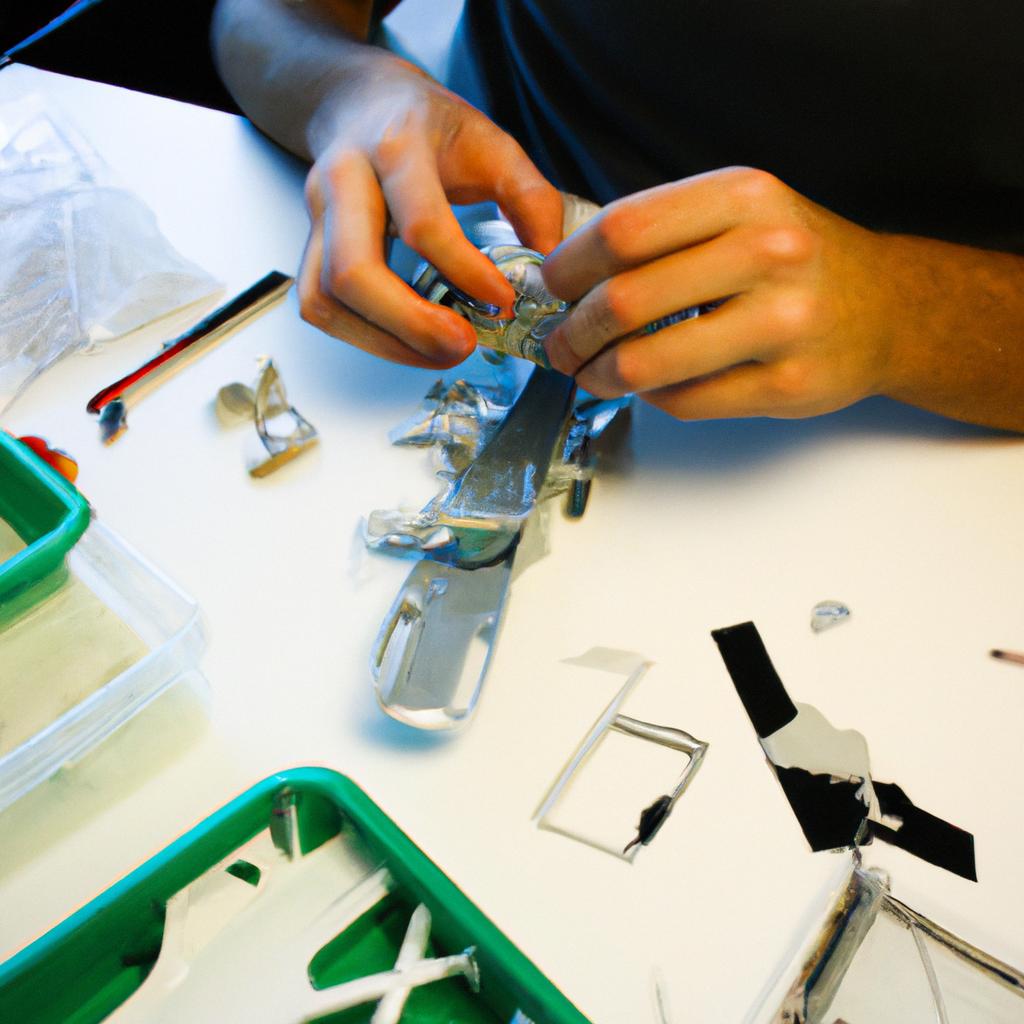 Person assembling RC plane parts